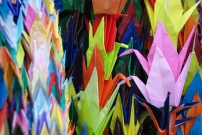 People around the world make cranes to display in Hiroshima Peace Park to express their desire for peace. By Erin Grace, CC BY-SA 3.0